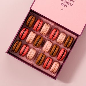 A mix of floral, fruity, and chocolate macarons all in one box.