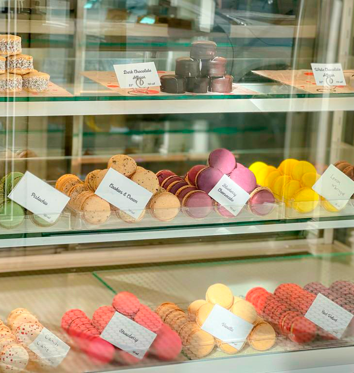 Woops! Bakeshop macaron counter with flavor labels