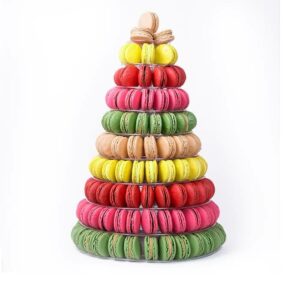 A white background features a large-sized French macaron pyramid with Vanilla, Lemon Meringue, Red Velvet, Strawberry, and Pistachio flavors.