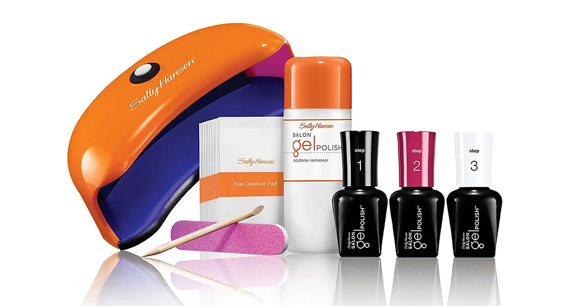 A nail kit features three nail polishes and manicure essentials.