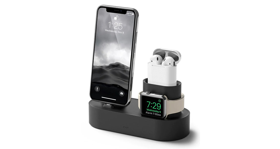 A pearl-colored multi charger device features an iPhone, Air Pods, and an Apple watch.