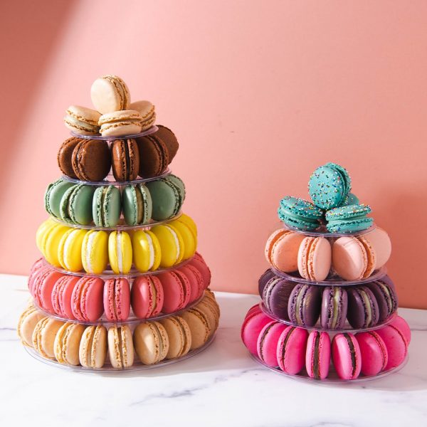 Two French macaron pyramids with assorted flavors.
