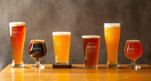 Six pints of different types of beer