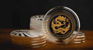  Silver and gold Chinese Dragon coins.