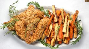 Matzo-crusted chicken and potato and sweet potato fries.